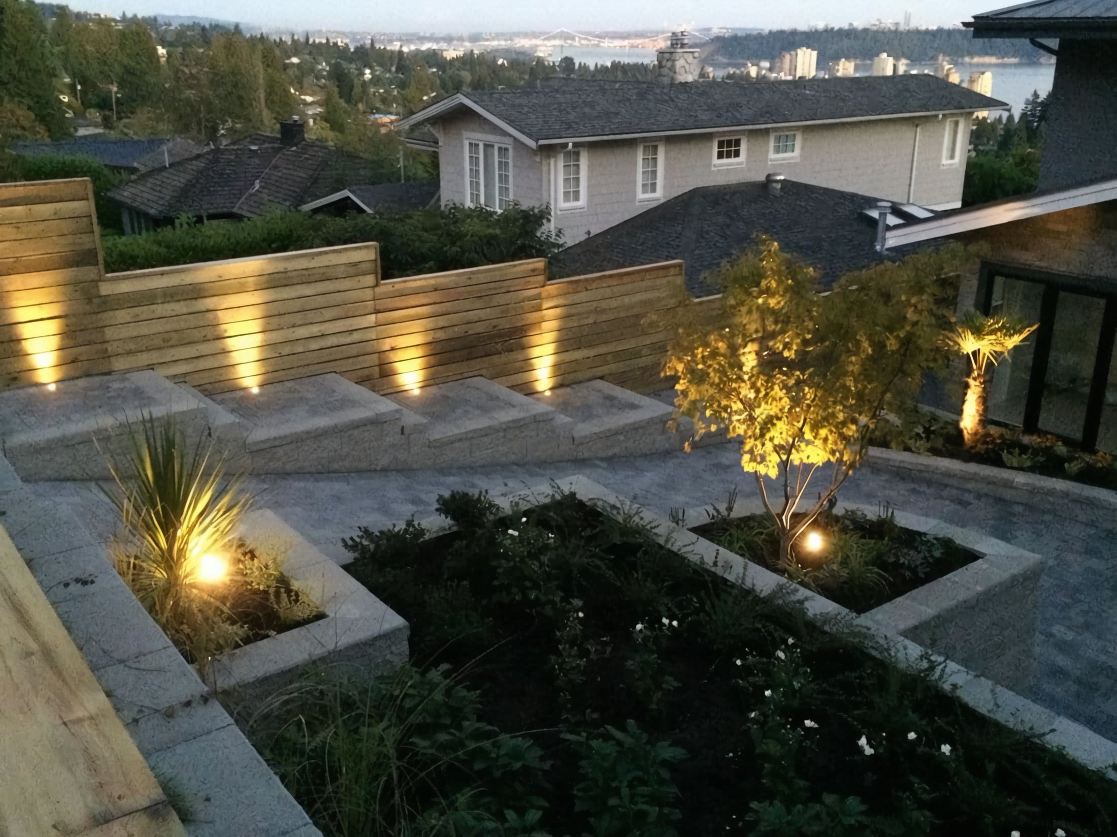 Engineered retaining wall, Cedar fencing, Heated driveway and Outdoor Lighting at the West Vancouver project.